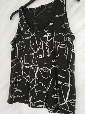 Stradivarius black sleeveless top with face pattern like new, Medium