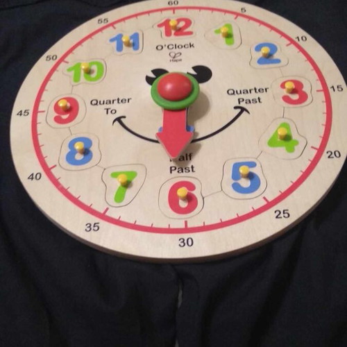 Wooden learning clock toy used