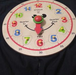 Wooden learning clock toy used