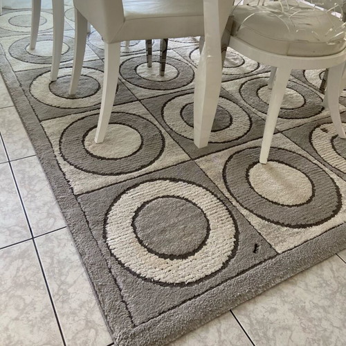 Rugs used, set of 3, gray with geometric patterns, one with defect