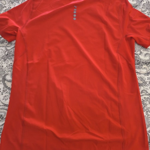 Puma men's technical sports t-shirt size M, like new, red with reflective details