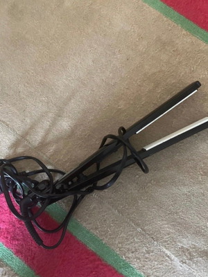 Hair Straightener used, fully functional for straight and curly hair