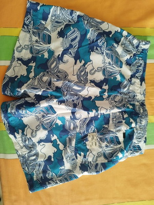 Puma men's swim shorts size Medium like new, light blue, white, blue