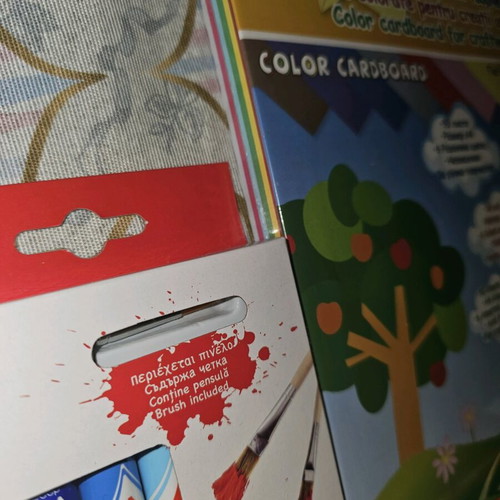 Art supplies like new with tempera, watercolors, plaster, brushes, and color papers
