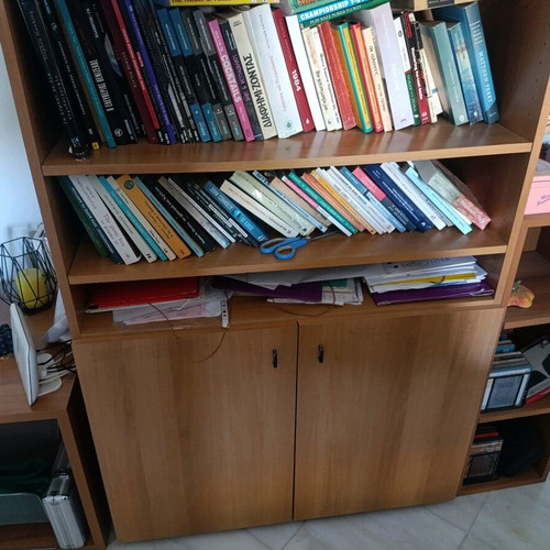 Desk with bookshelf and auxiliary table used