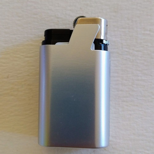 George Karelias and Sons metal promotional case with lighter new