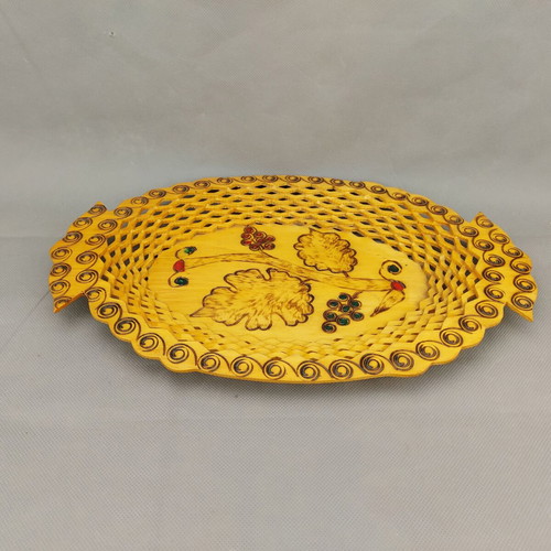Old beautiful wooden fruit plate used