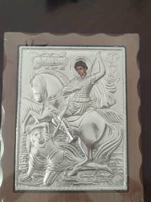 Saint Demetrios icon with embossed silver plating on wood