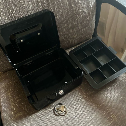 Safe like new with key for money and valuables