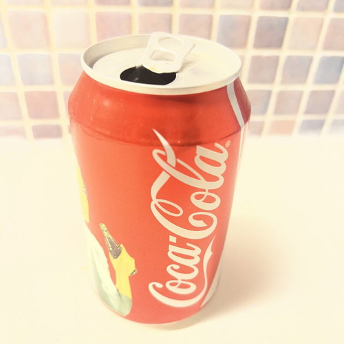 Coca Cola Woman collectible used, empty can