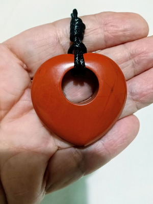 Semiprecious stone pendant with red jasper heart donut shape