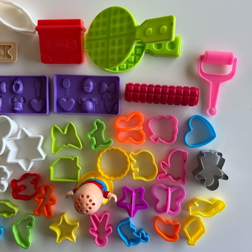 Play Doh Care and Carry Vet Playset used with modeling accessories