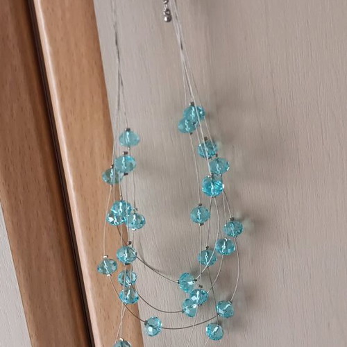 Blue necklace new with fishing line and blue stones