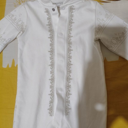 Juniors white cotton romper with designs, 6-9 months