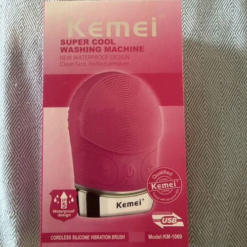 Kemei silicone facial cleansing brush with sonic pulses
