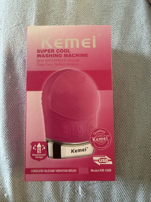 Kemei silicone facial cleansing brush with sonic pulses