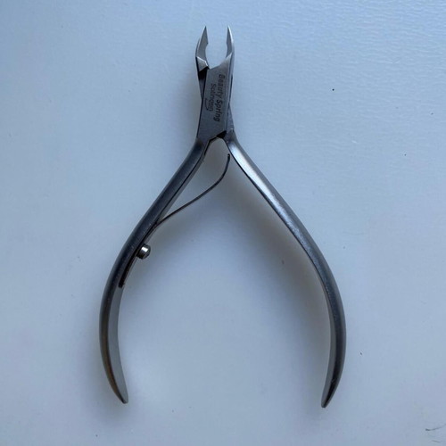 Manicure and cuticle nippers used, various models including Credo Solingen