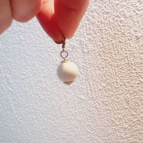 White hanging earrings used