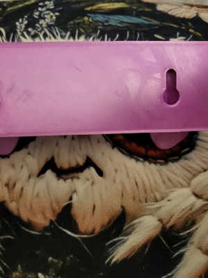 Wall hanger with skull design