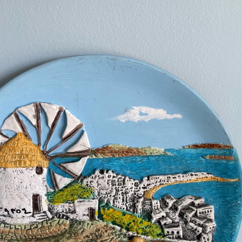 Embossed handmade decorative wall plate used with Paros motif