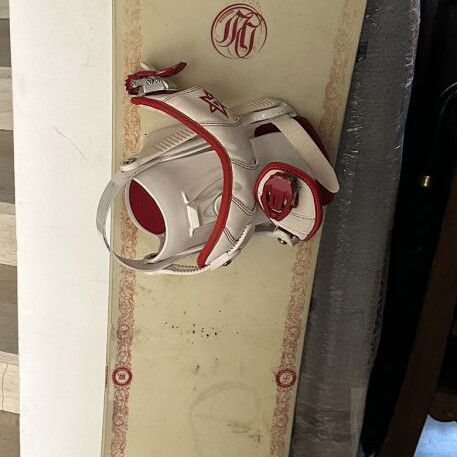 Snowboard used, includes case and boots size 43
