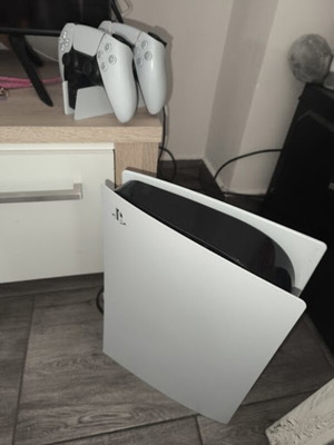 PlayStation 5 Disc Edition like new with 2 controllers and charging dock