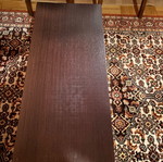Coffee table used, rectangular wood with hidden wheels