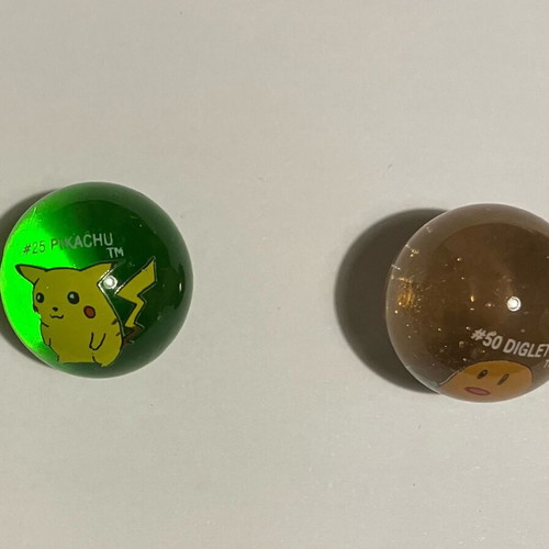 Pokemon collectible marbles used, set of 8