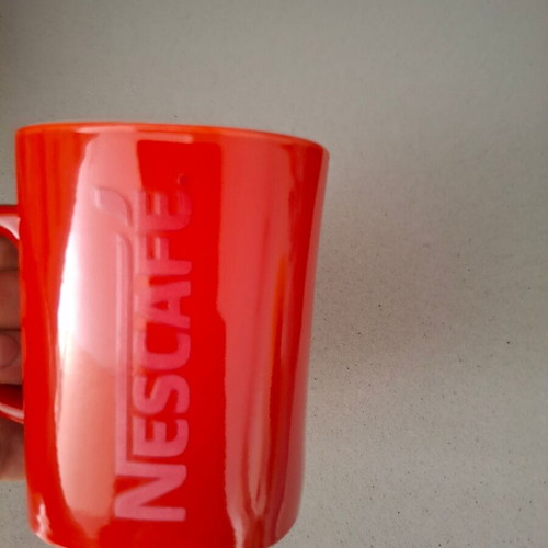 Nescafe mug used with red embossed letters, collectible