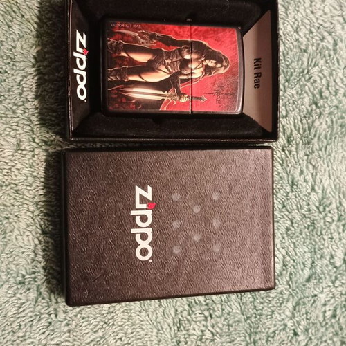 Zippo used collectible lighter with Rae design