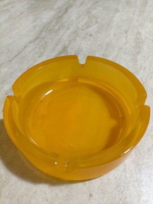 Glass ashtray orange like new