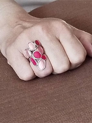 Ring used with enamel and steel base in pink shades