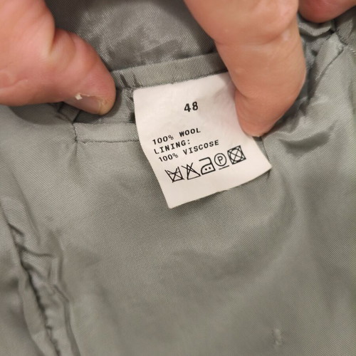 Suit used, beige jacket and trousers