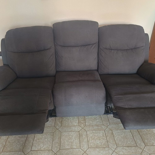 Three-seater sofa and armchair used