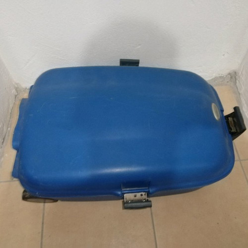 Hard plastic suitcase with lock and wheels