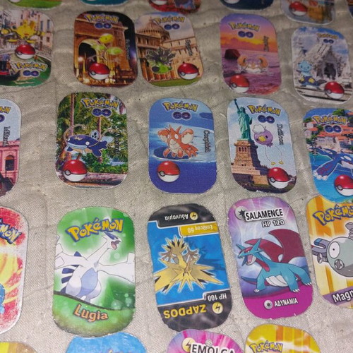 Pokémon metal tags like new, pack of 116 plus 5 large