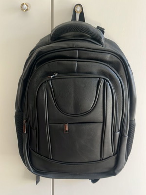 Backpack bag new, black with laptop compartment and multiple pockets
