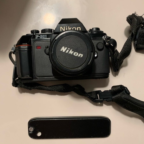 Nikon F-301 with nikkor 50mm 1:1.8 lens and HoyaHMC filter like new