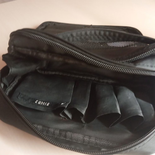 Toiletry bag like new, black, 2 compartments with many slots
