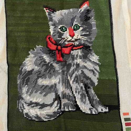 Handmade framed textile painting used with green background
