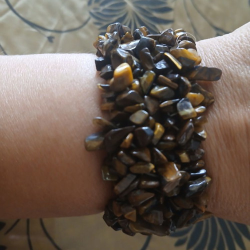 Wide bracelet with elastic made of tiger eye stone like new