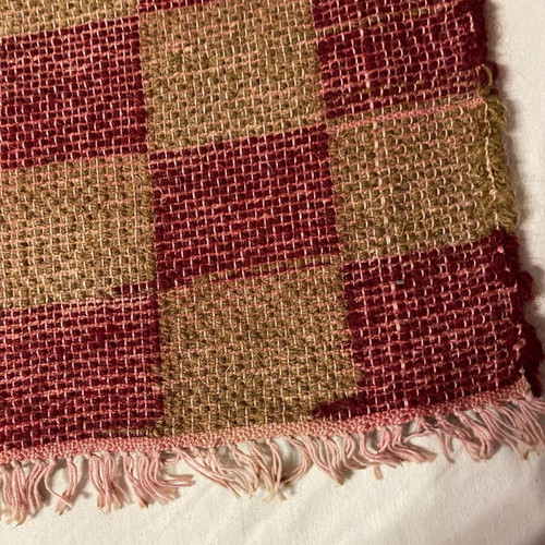 Handmade wool rug runner with checkered pattern like new