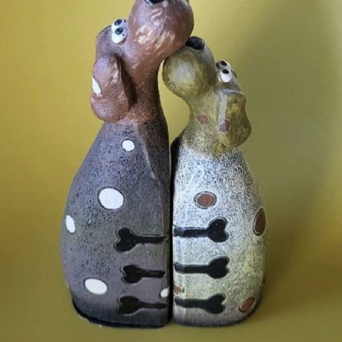 Decorative dogs like new in earthy tones