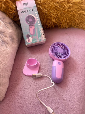 Handheld mini fan with stand
