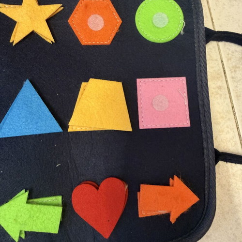 Montessori activity bag with dinosaur design, felt busy board