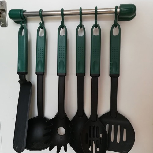 Set of 6 used serving utensils with hanging rail