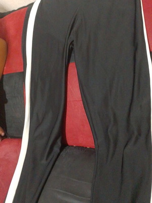 Women's leggings like new, black shiny with white side stripe, size M