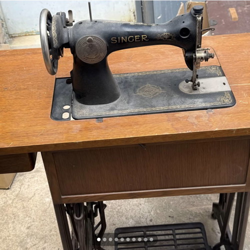 Singer sewing machine used with cabinet
