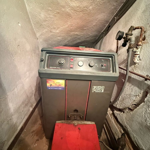 Oil boiler used with accessories for two apartments