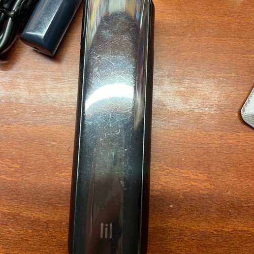 Iqos lil solid like new with accessories and 4 packs